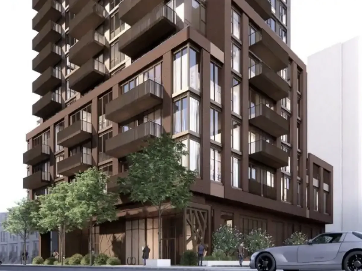 Rendering of view from sidewalk level of proposed brick and glass tall building